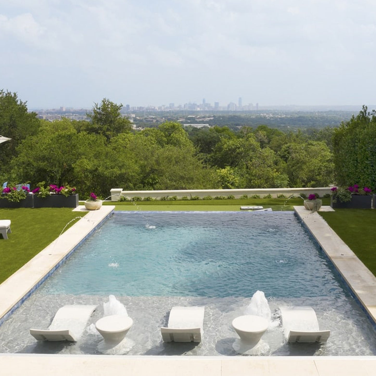 Ledge Lounger In-Pool Furniture featuring Signature Chaise and Side Tables